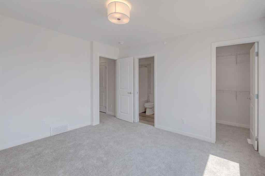 MLS® A2232075 - 44 Herron Walk NE in Livingston Calgary, Residential