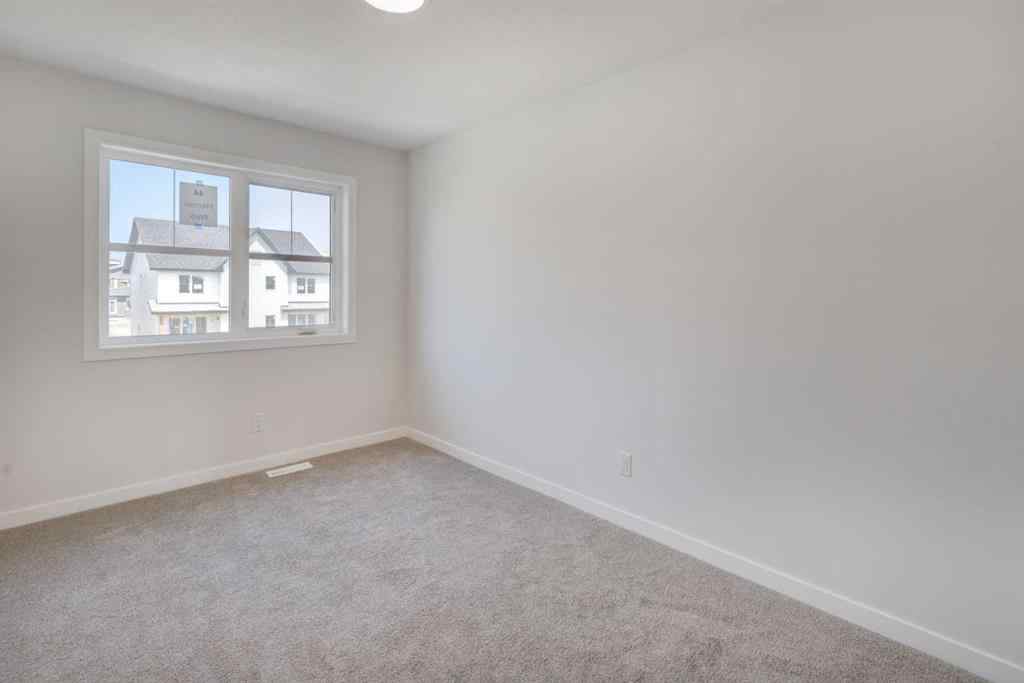 MLS® A2232075 - 44 Herron Walk NE in Livingston Calgary, Residential