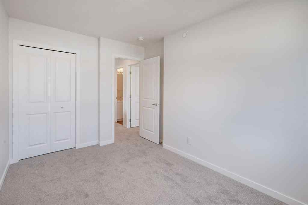 MLS® A2232075 - 44 Herron Walk NE in Livingston Calgary, Residential