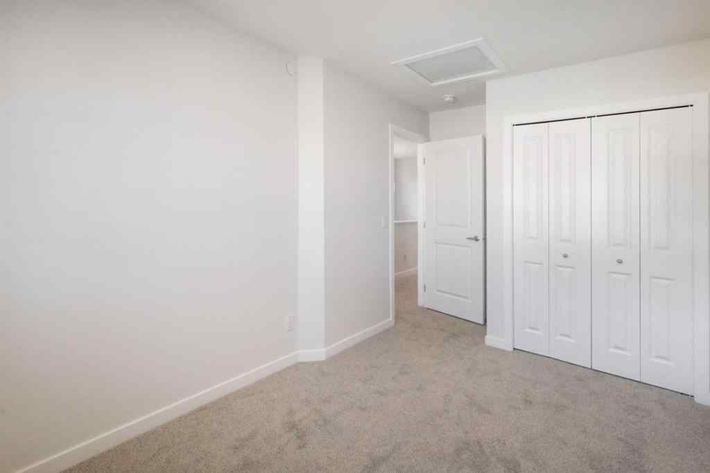 MLS® A2232075 - 44 Herron Walk NE in Livingston Calgary, Residential