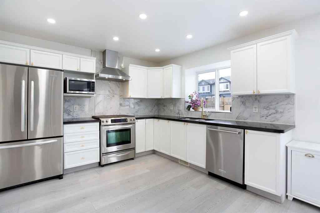 MLS® A2232103 - 209 Luxstone Road SW in Luxstone Airdrie, Residential