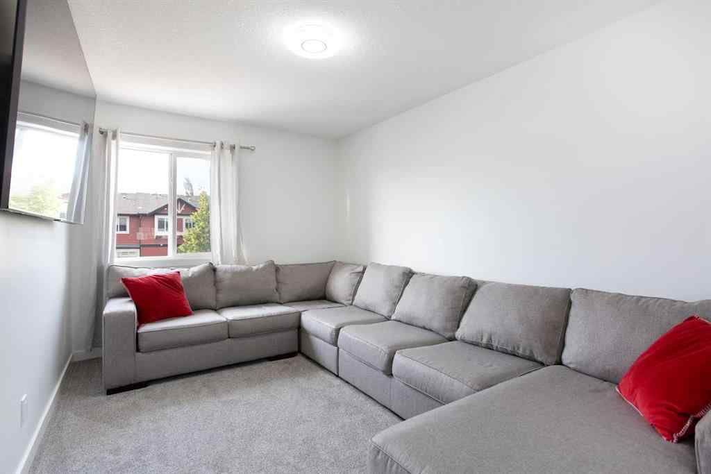 MLS® A2232103 - 209 Luxstone Road SW in Luxstone Airdrie, Residential