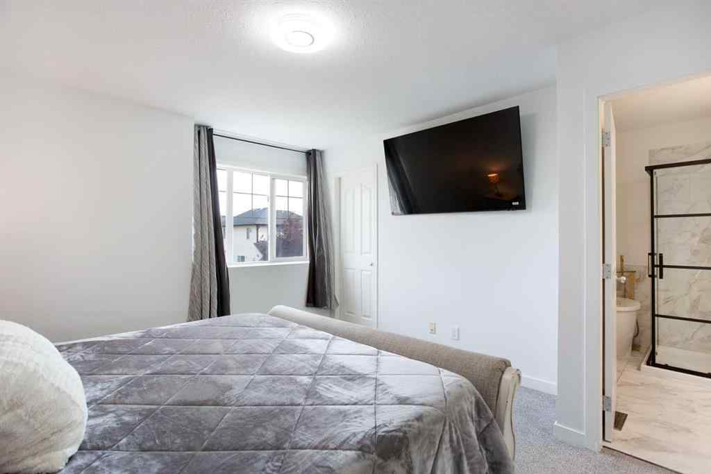 MLS® A2232103 - 209 Luxstone Road SW in Luxstone Airdrie, Residential