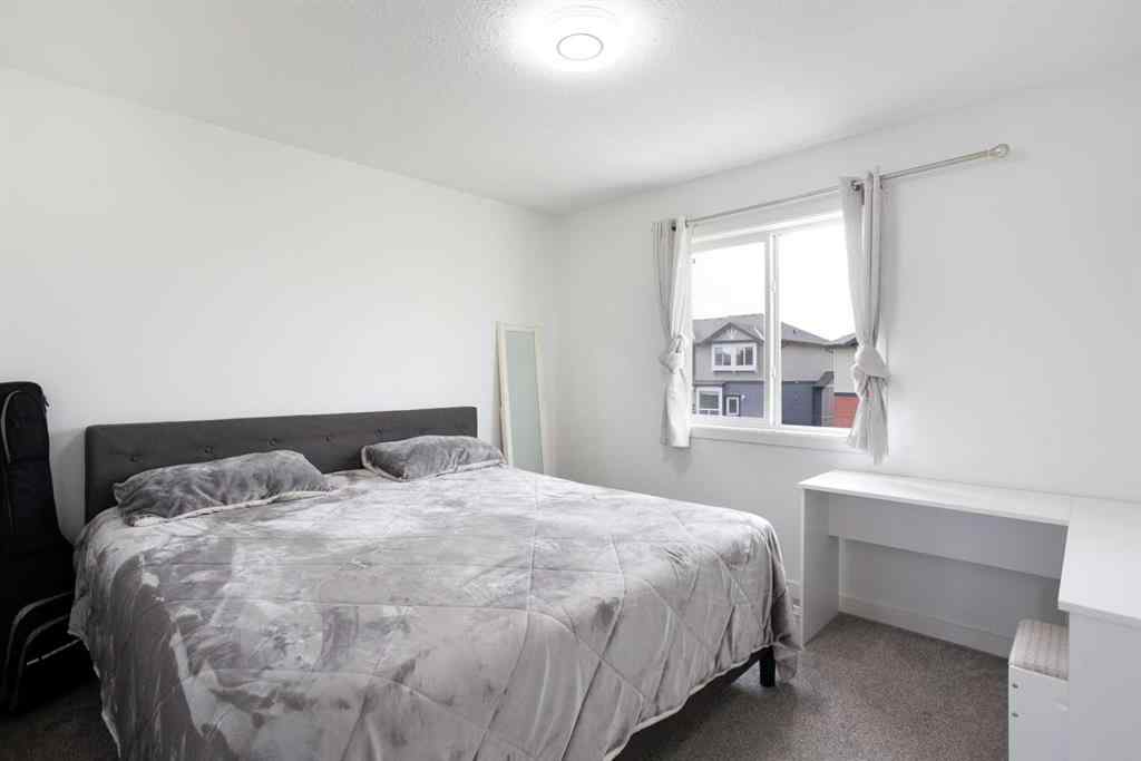 MLS® A2232103 - 209 Luxstone Road SW in Luxstone Airdrie, Residential