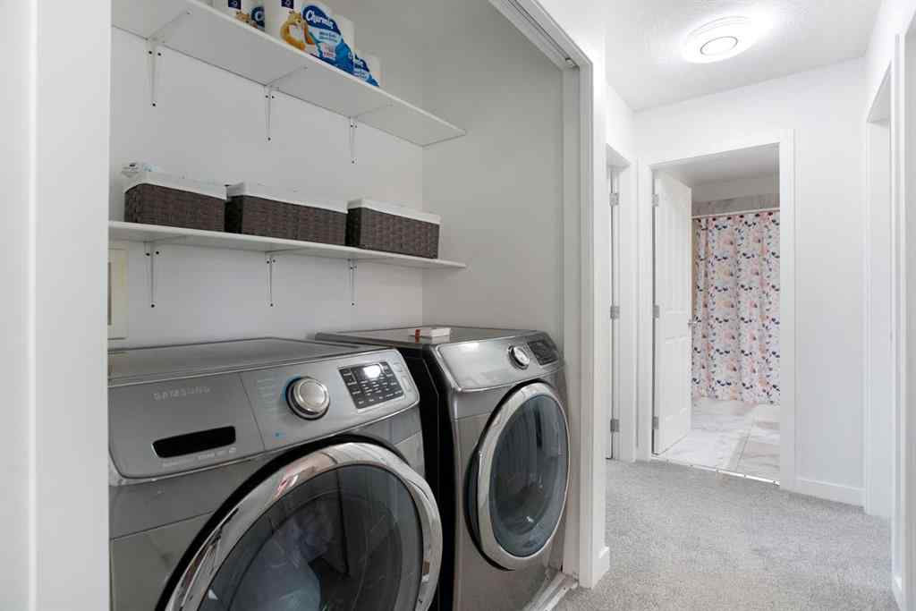 MLS® A2232103 - 209 Luxstone Road SW in Luxstone Airdrie, Residential