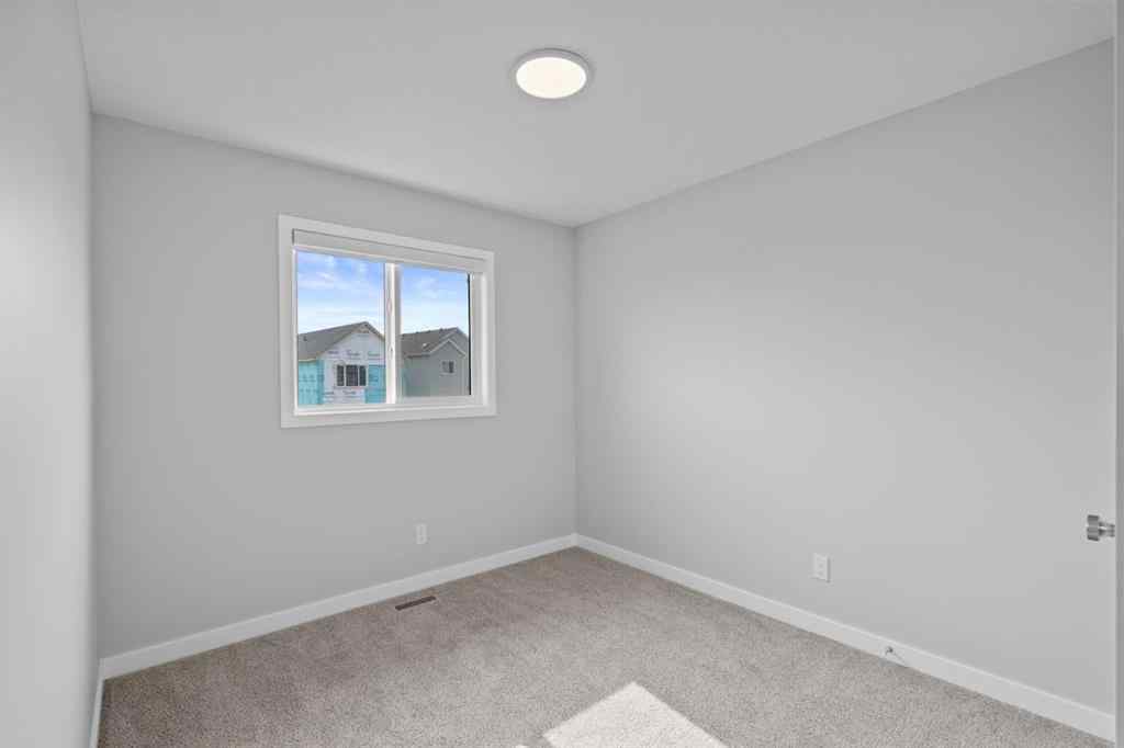 MLS® A2232143 - 114 Lewiston Way NE in Lewisburg Calgary, Residential