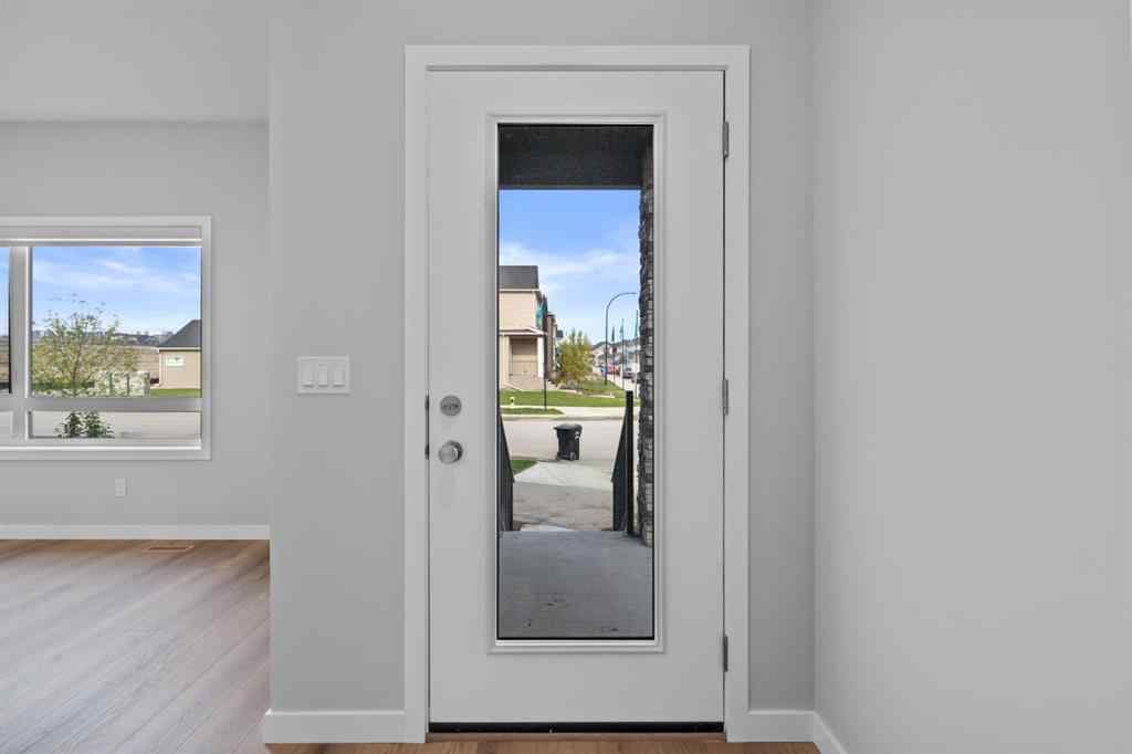 MLS® A2232143 - 114 Lewiston Way NE in Lewisburg Calgary, Residential
