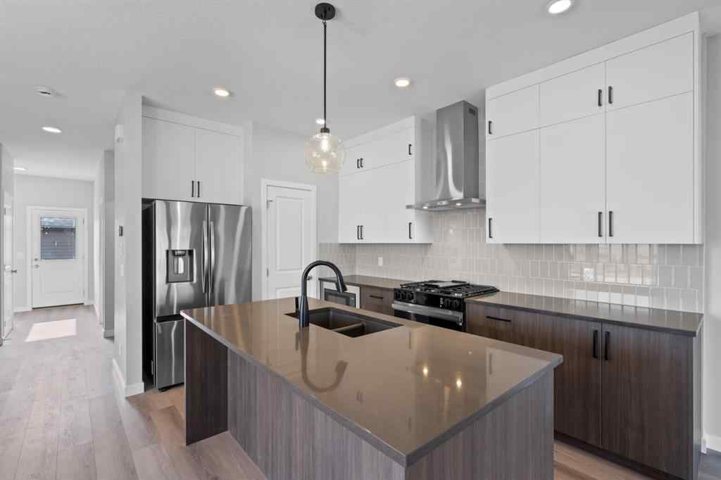 MLS® A2232143 - 114 Lewiston Way NE in Lewisburg Calgary, Residential