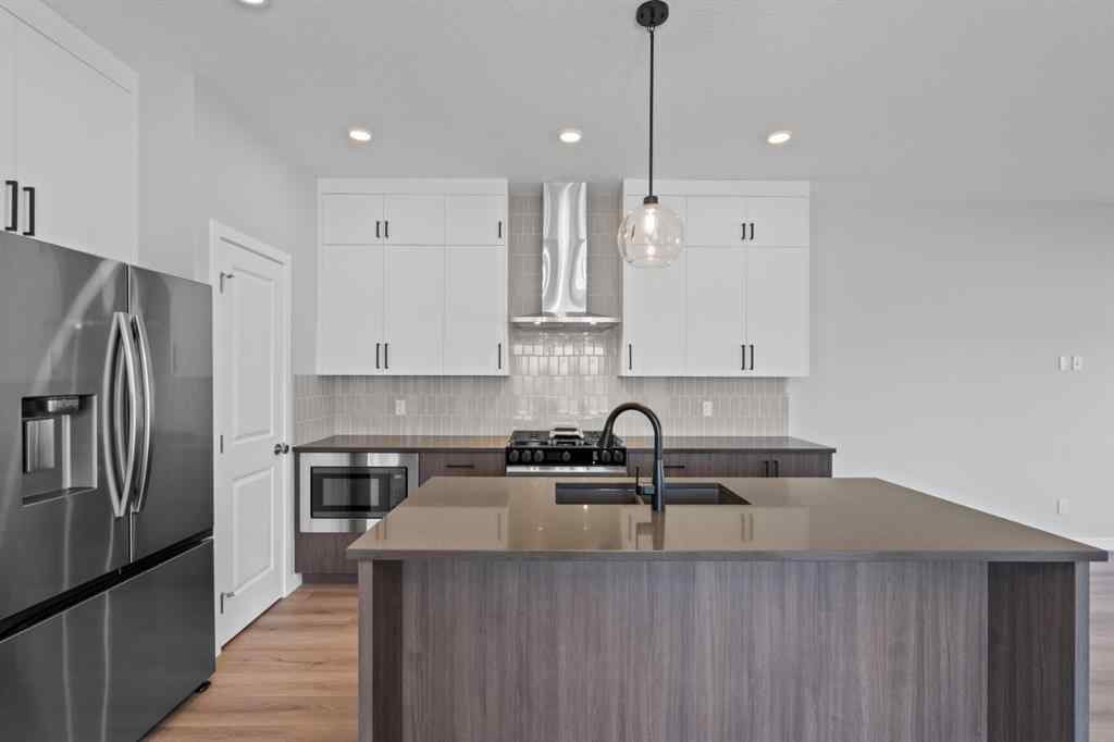 MLS® A2232143 - 114 Lewiston Way NE in Lewisburg Calgary, Residential