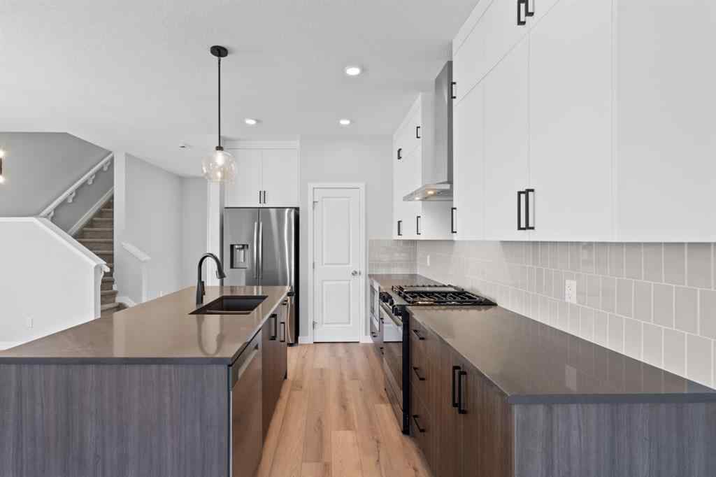 MLS® A2232143 - 114 Lewiston Way NE in Lewisburg Calgary, Residential