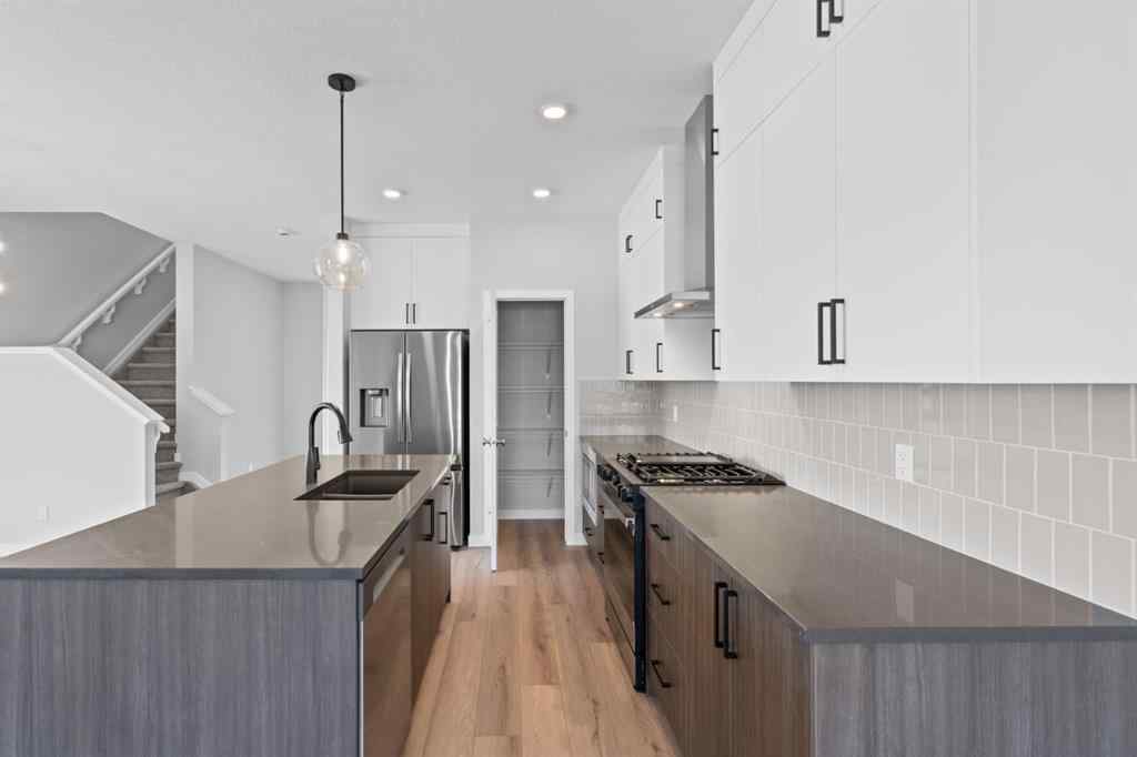 MLS® A2232143 - 114 Lewiston Way NE in Lewisburg Calgary, Residential