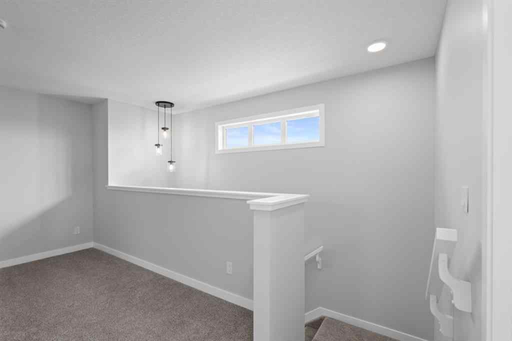 MLS® A2232143 - 114 Lewiston Way NE in Lewisburg Calgary, Residential