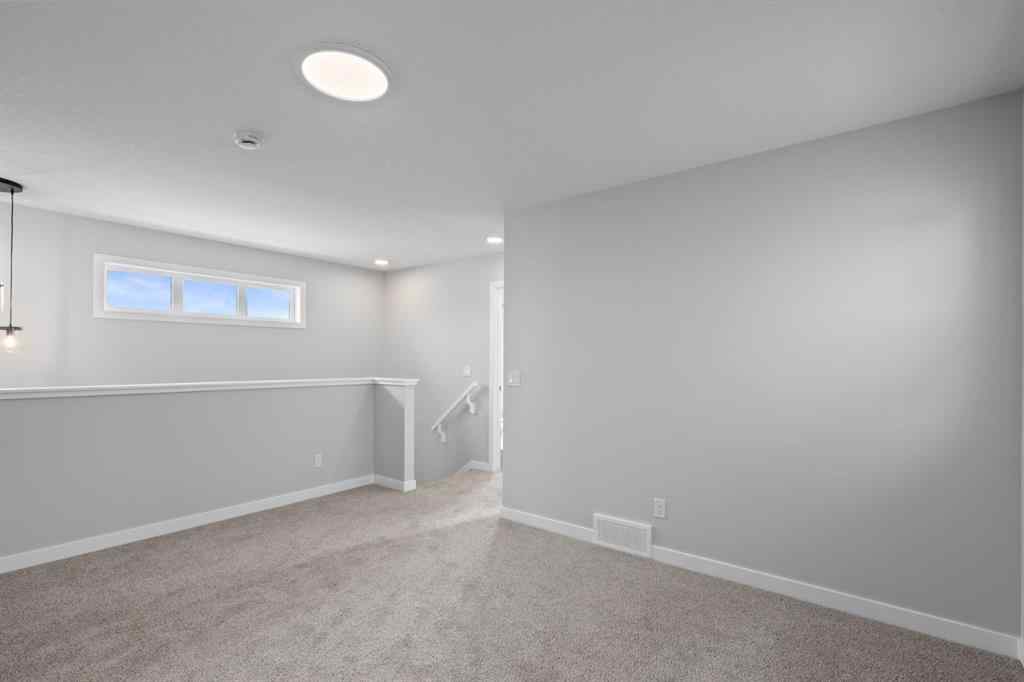 MLS® A2232143 - 114 Lewiston Way NE in Lewisburg Calgary, Residential
