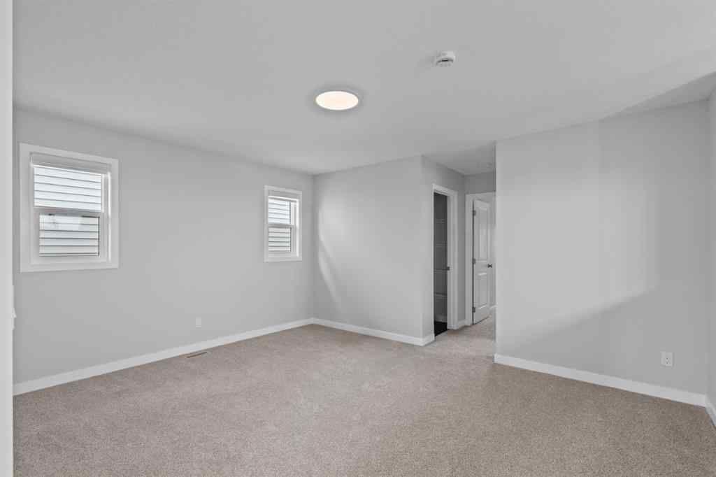 MLS® A2232143 - 114 Lewiston Way NE in Lewisburg Calgary, Residential