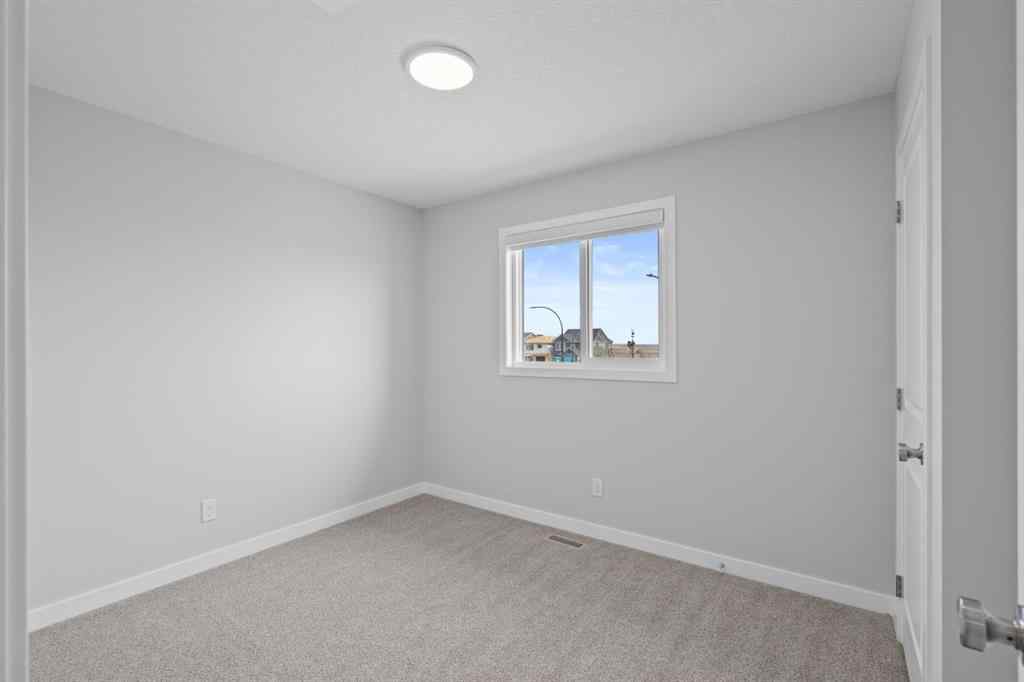 MLS® A2232143 - 114 Lewiston Way NE in Lewisburg Calgary, Residential
