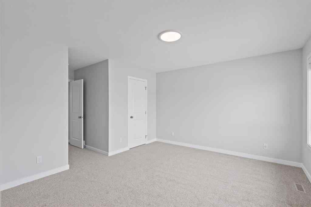 MLS® A2232143 - 114 Lewiston Way NE in Lewisburg Calgary, Residential