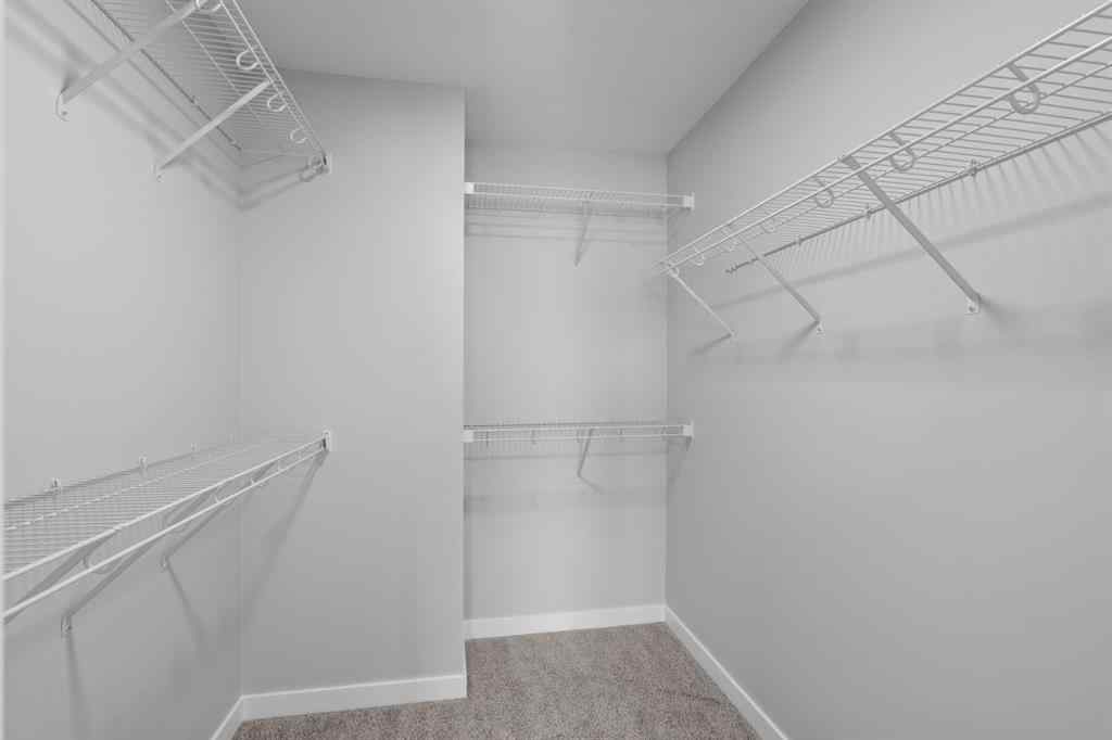 MLS® A2232143 - 114 Lewiston Way NE in Lewisburg Calgary, Residential