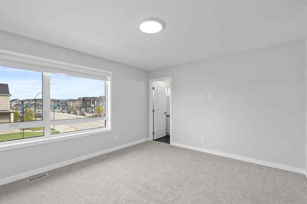 MLS® A2232143 - 114 Lewiston Way NE in Lewisburg Calgary, Residential