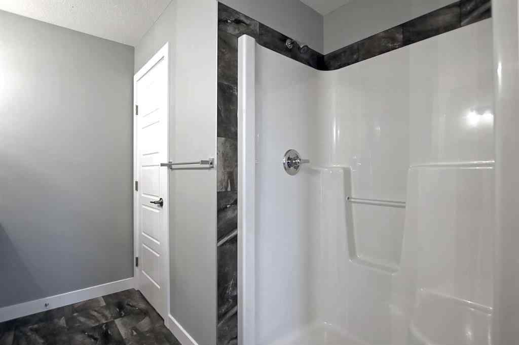 MLS® A2232172 - 47 Agate Road  in Greystone Cochrane, Residential
