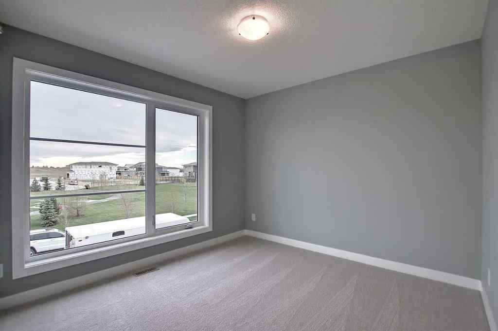 MLS® A2232172 - 47 Agate Road  in Greystone Cochrane, Residential