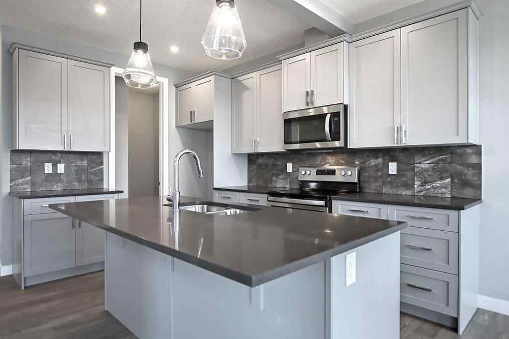 MLS® A2232172 - 47 Agate Road  in Greystone Cochrane, Residential