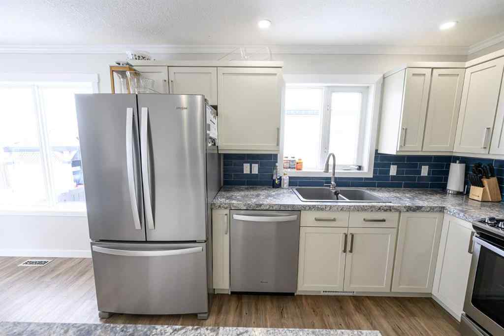 MLS® A2232204 - 11922 105 Street  in Royal Oaks Grande Prairie, Residential