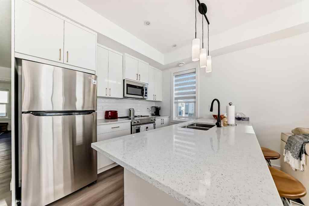 MLS® A2232248 - Unit #165 2117 81 Street SW in Springbank Hill Calgary, Residential