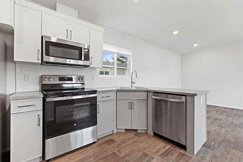 MLS® A2232260 - Unit #5 6220 17 Avenue SE in Red Carpet Calgary, Mobile