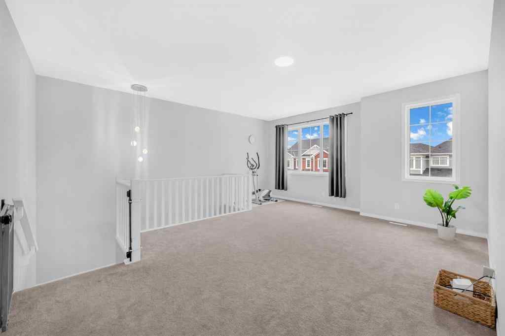 MLS® A2232355 - 52 Yorkstone Grove SW in Yorkville Calgary, Residential