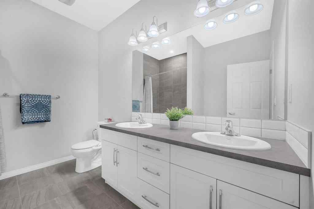 MLS® A2232355 - 52 Yorkstone Grove SW in Yorkville Calgary, Residential