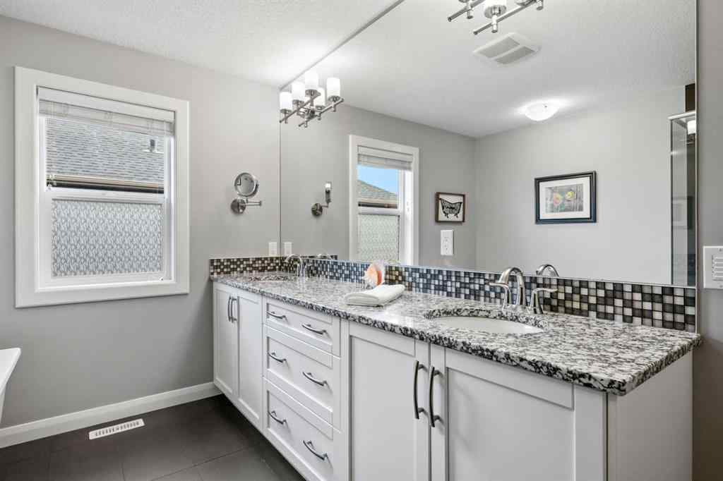 MLS® A2232363 - 136 Kinniburgh Drive  in Kinniburgh North Chestermere, Residential