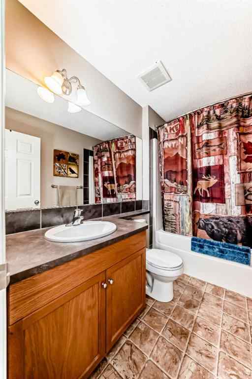 MLS® A2232523 - 65 Sunset Heights  in Sunset Ridge Cochrane, Residential