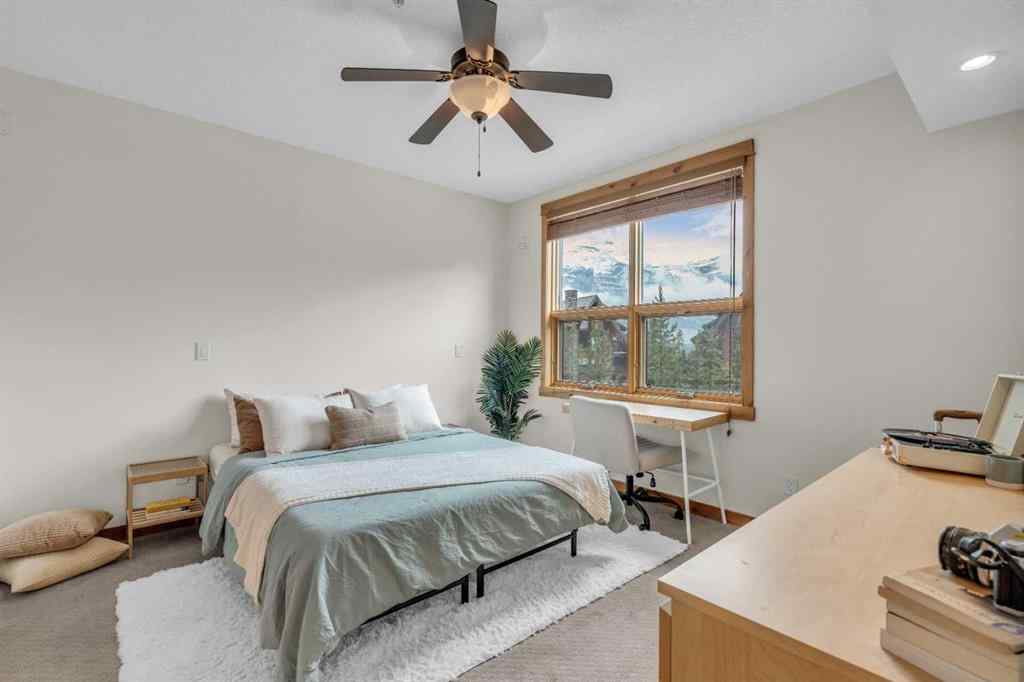MLS® A2232578 - Unit #201 2100B STEWART CREEK Drive  in Three Sisters Canmore, Residential