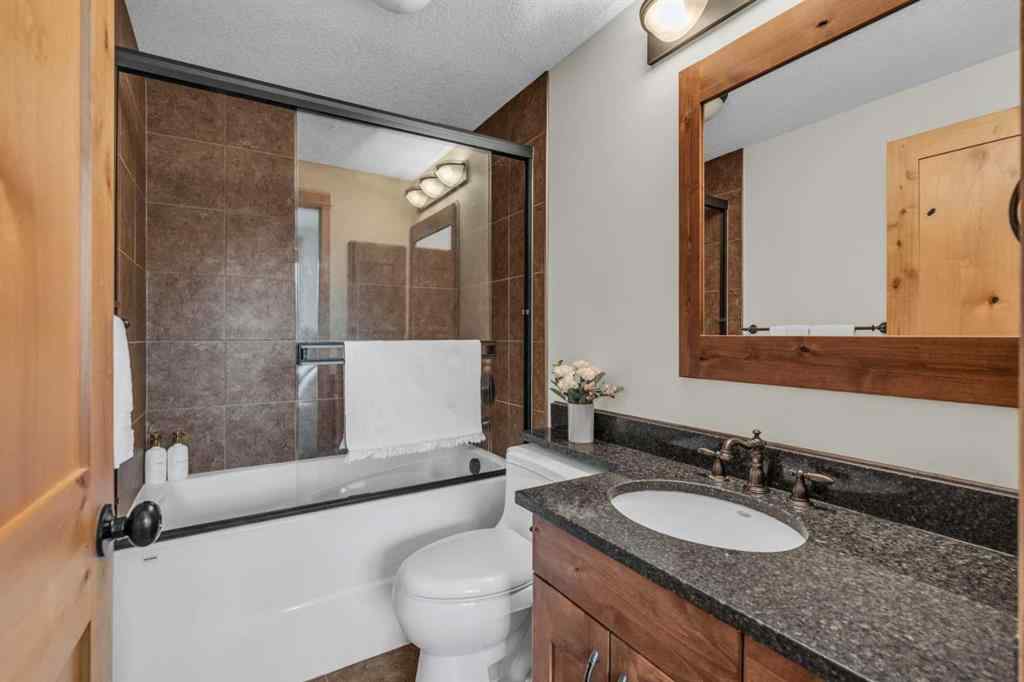 MLS® A2232578 - Unit #201 2100B STEWART CREEK Drive  in Three Sisters Canmore, Residential