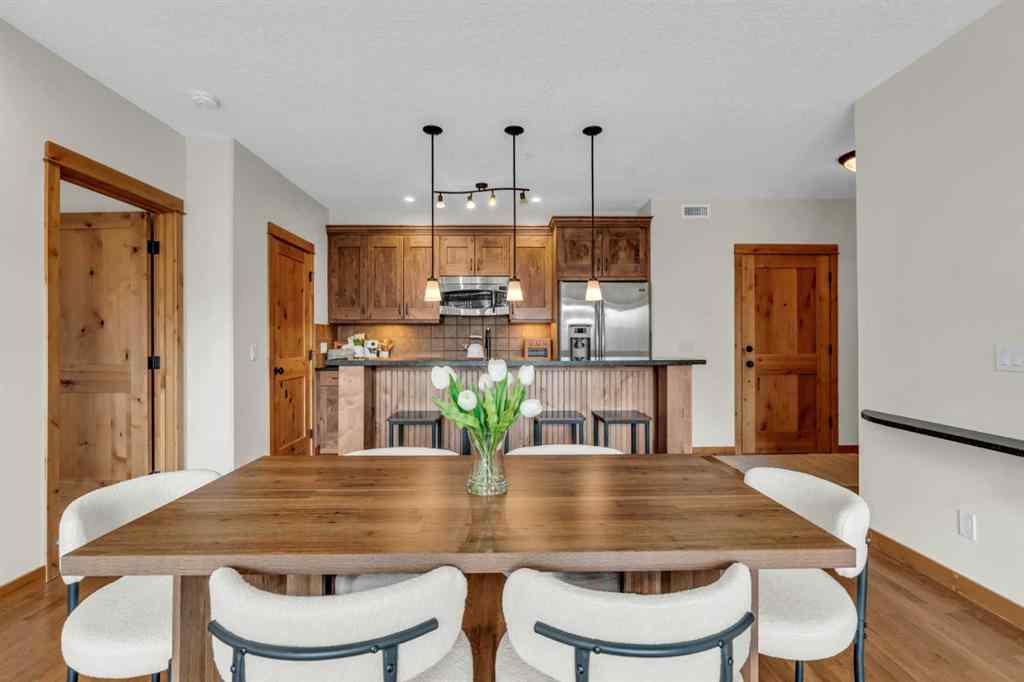 MLS® A2232578 - Unit #201 2100B STEWART CREEK Drive  in Three Sisters Canmore, Residential