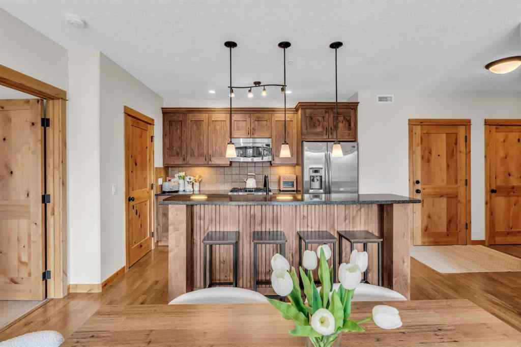 MLS® A2232578 - Unit #201 2100B STEWART CREEK Drive  in Three Sisters Canmore, Residential