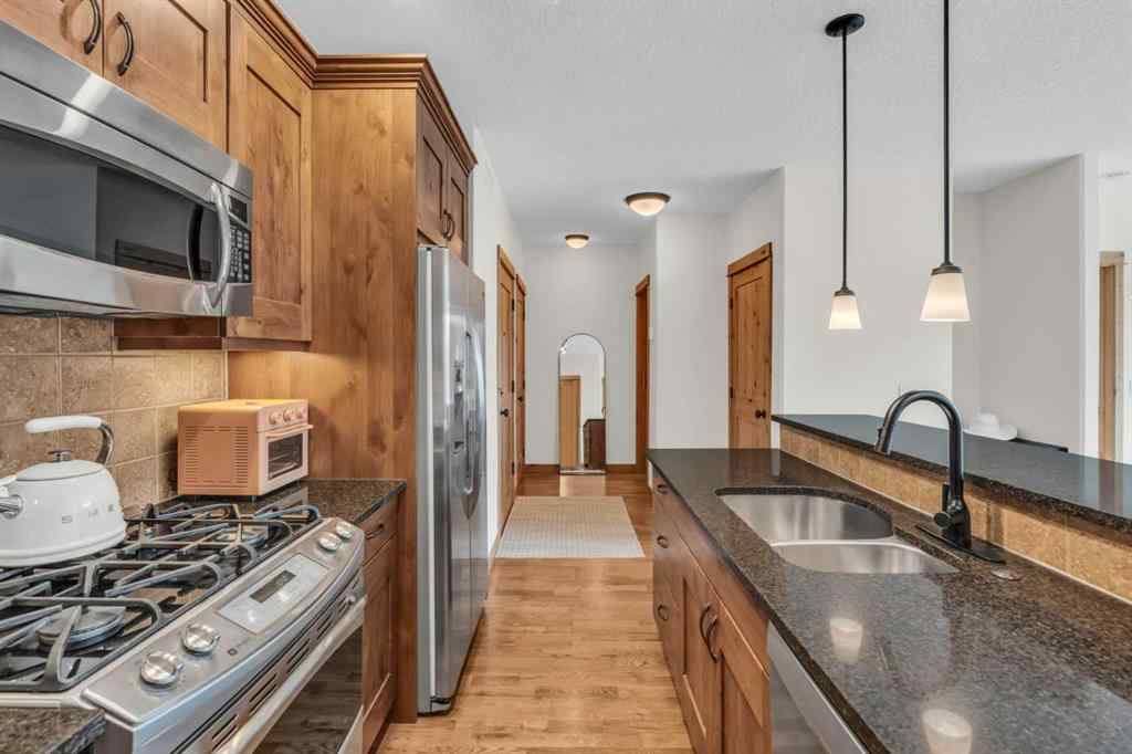 MLS® A2232578 - Unit #201 2100B STEWART CREEK Drive  in Three Sisters Canmore, Residential