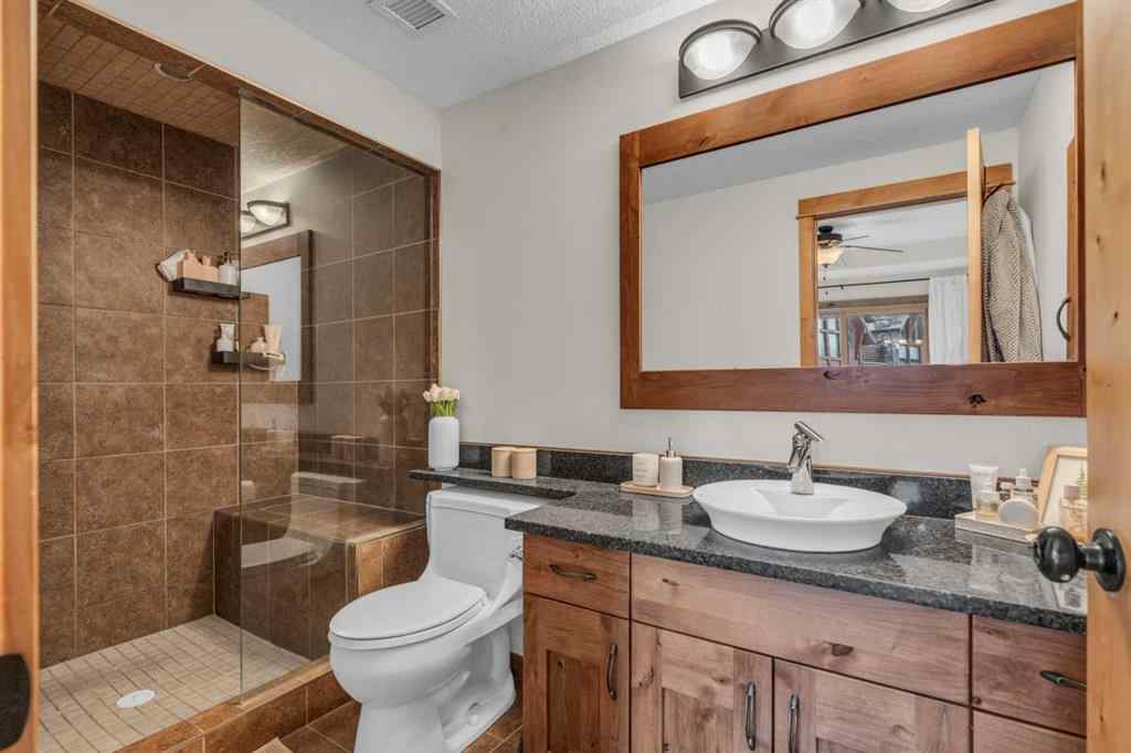 MLS® A2232578 - Unit #201 2100B STEWART CREEK Drive  in Three Sisters Canmore, Residential