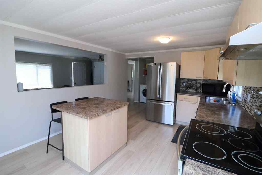MLS® A2232713 - 60 Spring Haven Road SE in Big Springs Airdrie, Residential