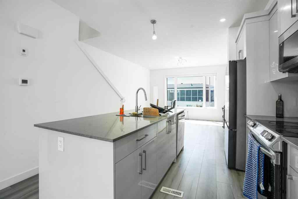 MLS® A2232747 - 235 Saddlepeace Crescent NE in Saddle Ridge Calgary, Residential