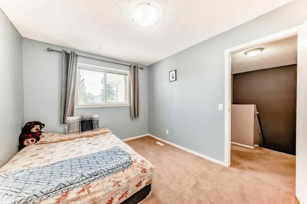 MLS® A2232768 - Unit #111 3015 51 Street SW in Glenbrook Calgary, Residential