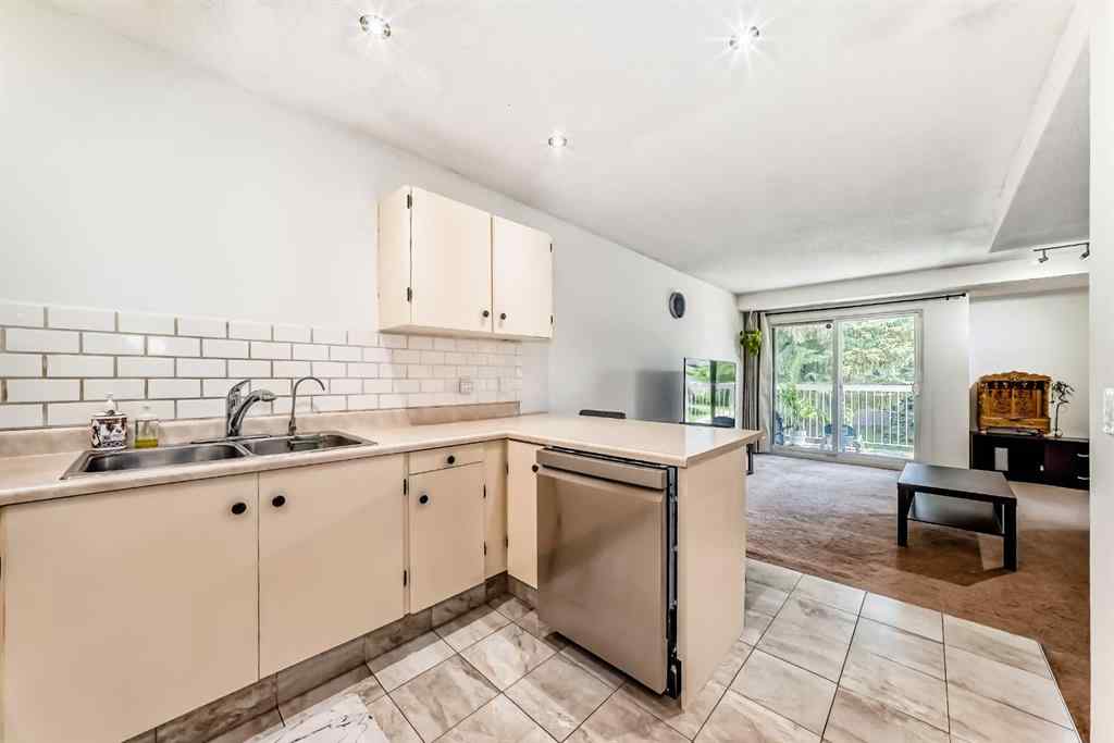 MLS® A2232768 - Unit #111 3015 51 Street SW in Glenbrook Calgary, Residential