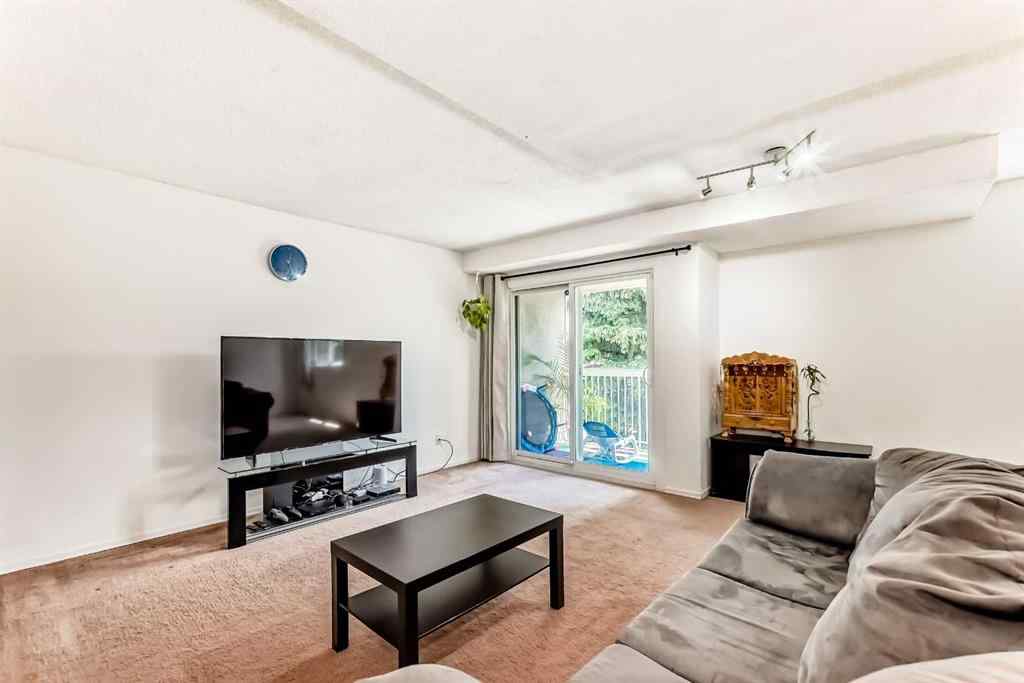 MLS® A2232768 - Unit #111 3015 51 Street SW in Glenbrook Calgary, Residential