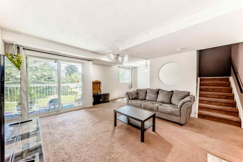 MLS® A2232768 - Unit #111 3015 51 Street SW in Glenbrook Calgary, Residential