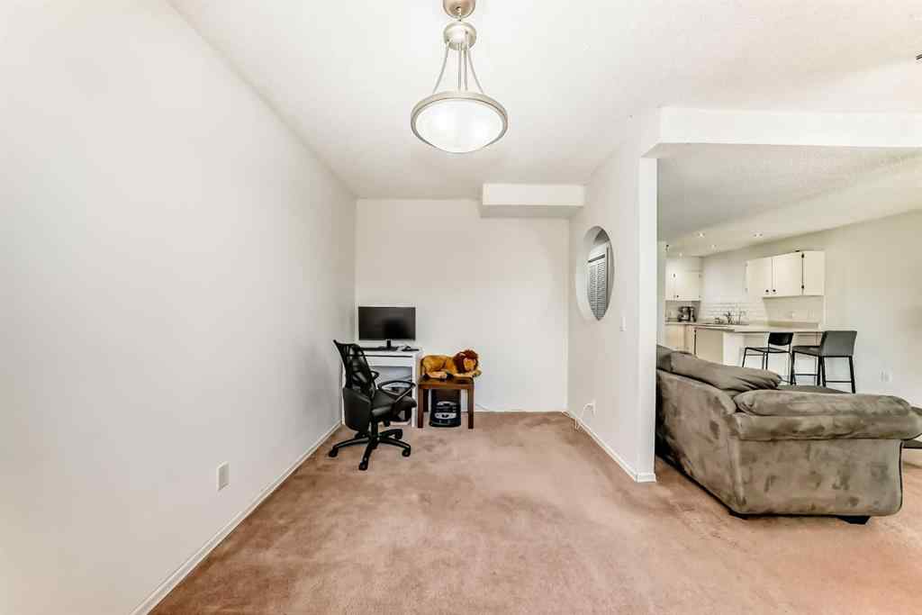 MLS® A2232768 - Unit #111 3015 51 Street SW in Glenbrook Calgary, Residential
