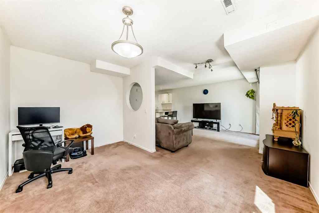 MLS® A2232768 - Unit #111 3015 51 Street SW in Glenbrook Calgary, Residential