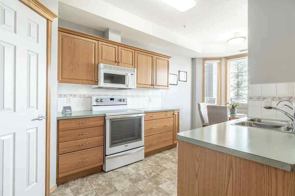 MLS® A2232863 - Unit #219 15 Everstone Drive SW in Evergreen Calgary, Residential