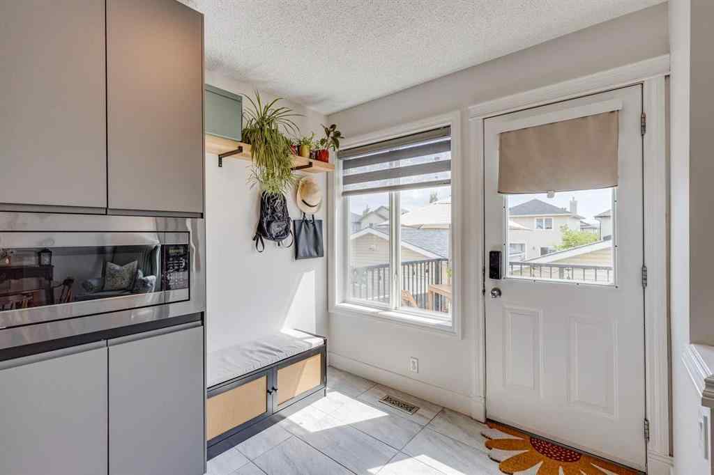 MLS® A2232898 - 202 Evansmeade Close NW in Evanston Calgary, Residential