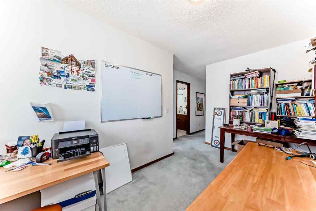 MLS® A2232962 - 12 Stradwick Rise SW in Strathcona Park Calgary, Residential