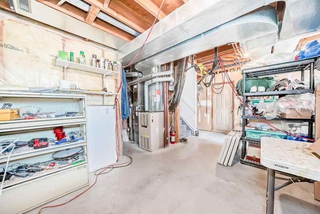 MLS® A2232962 - 12 Stradwick Rise SW in Strathcona Park Calgary, Residential